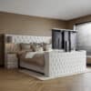 Boxspring Maximus met TV-lift en geknoopt design in luxe slaapkamer