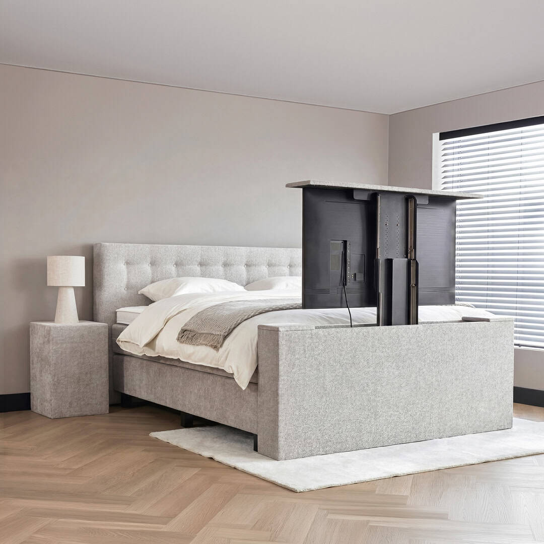 Boxspring Nova met geïntegreerde TV-lift en modern gestoffeerd hoofdbord